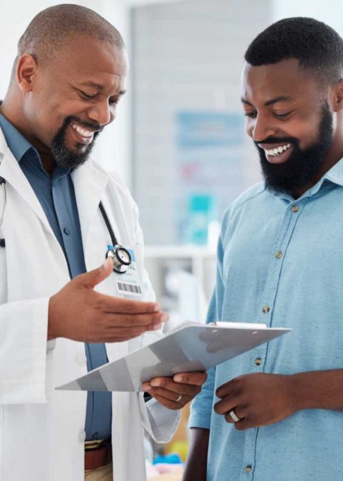 young-patient-in-a-consult-with-his-doctor-african-P7MKKST-reyy5wx8fazl3n4wi522fve7t16oxdsm4u60d1uyqg.jpg
